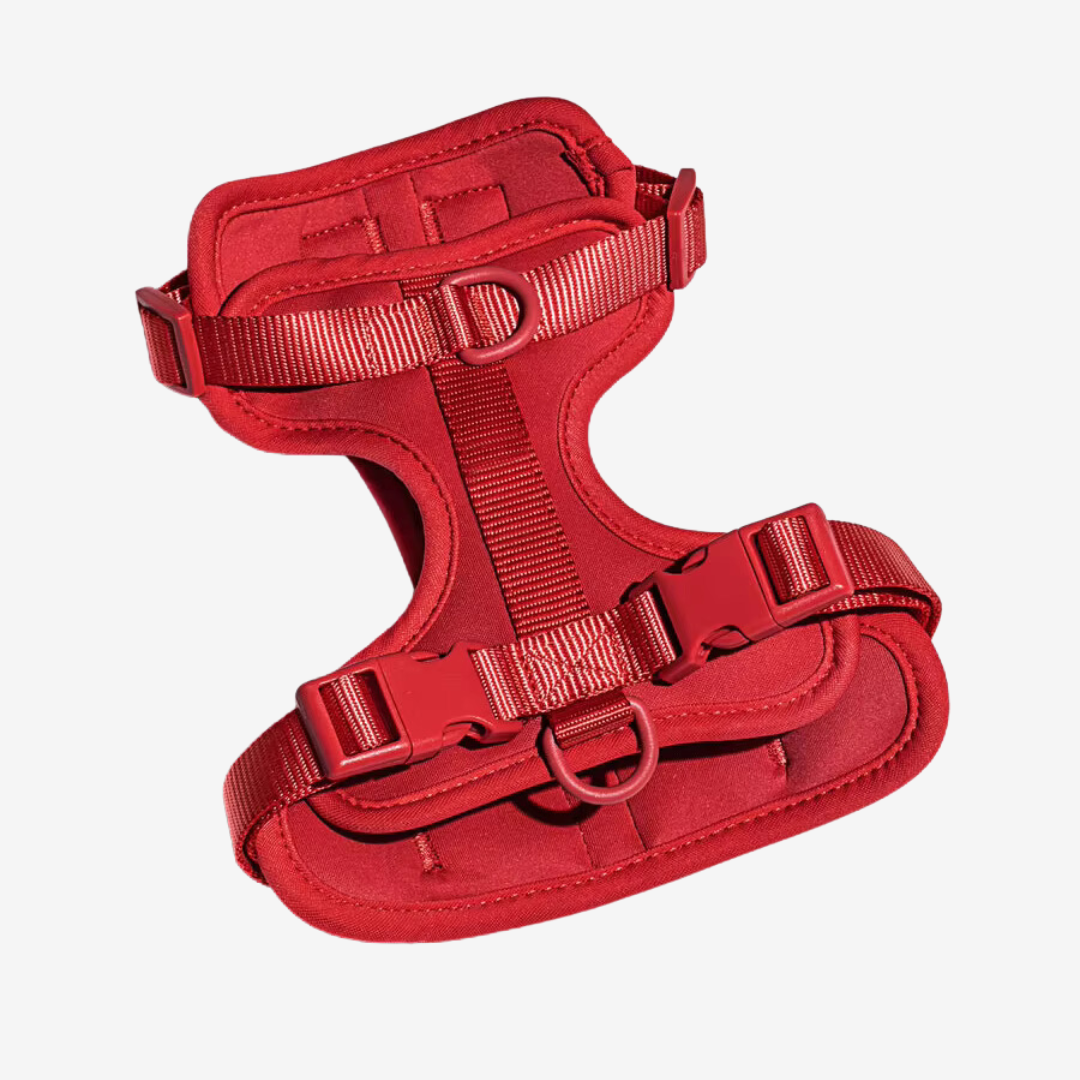 Röd hundsele i premiumdesign med justerbar passform och vadderad insida. Ergonomisk och bekväm, perfekt för både små och stora hundar. Passar för promenader och utomhusaktiviteter.