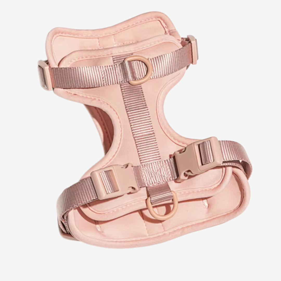 Rosa hundsele i premiumdesign med justerbar passform och vadderad insida. Ergonomisk och bekväm, perfekt för både små och stora hundar. Passar för promenader och utomhusaktiviteter.